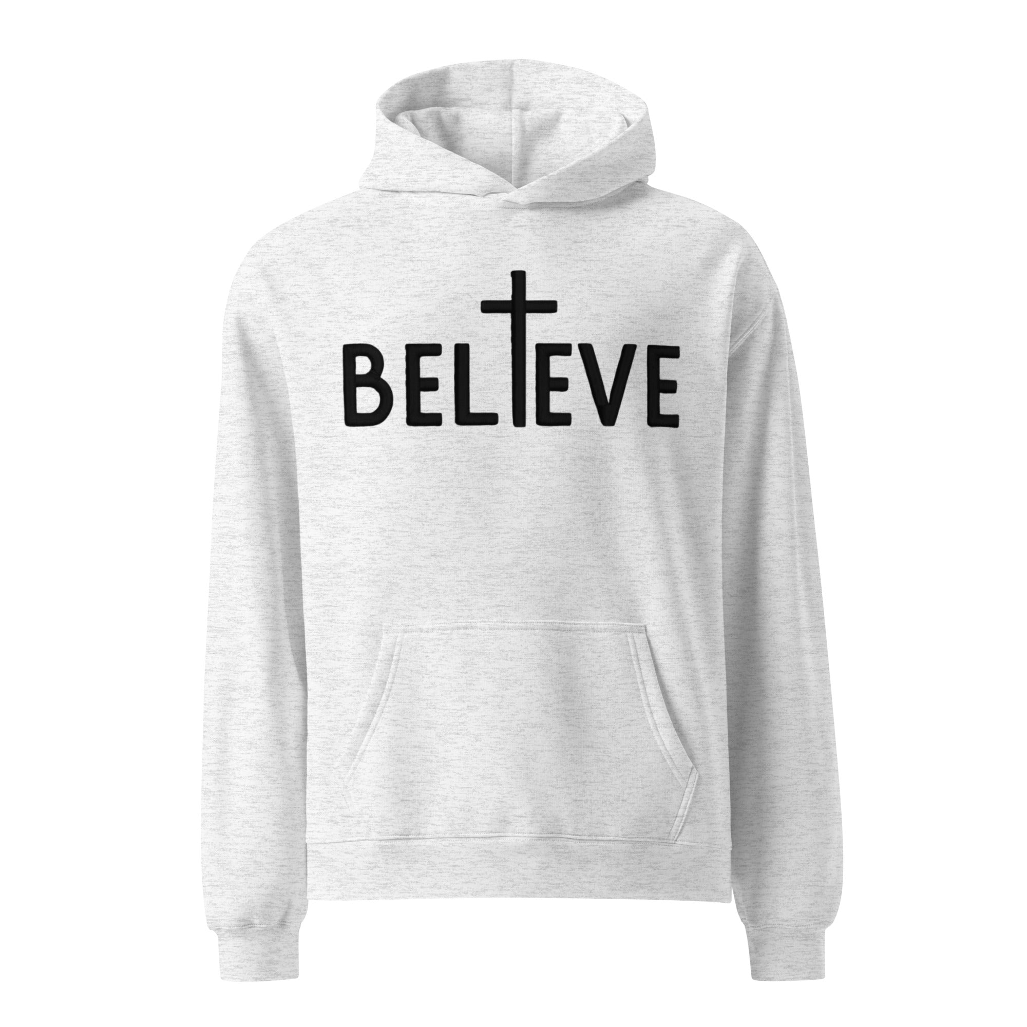 Product mockup for grey hoodie with black text that says Believe with a cross replacing the I.